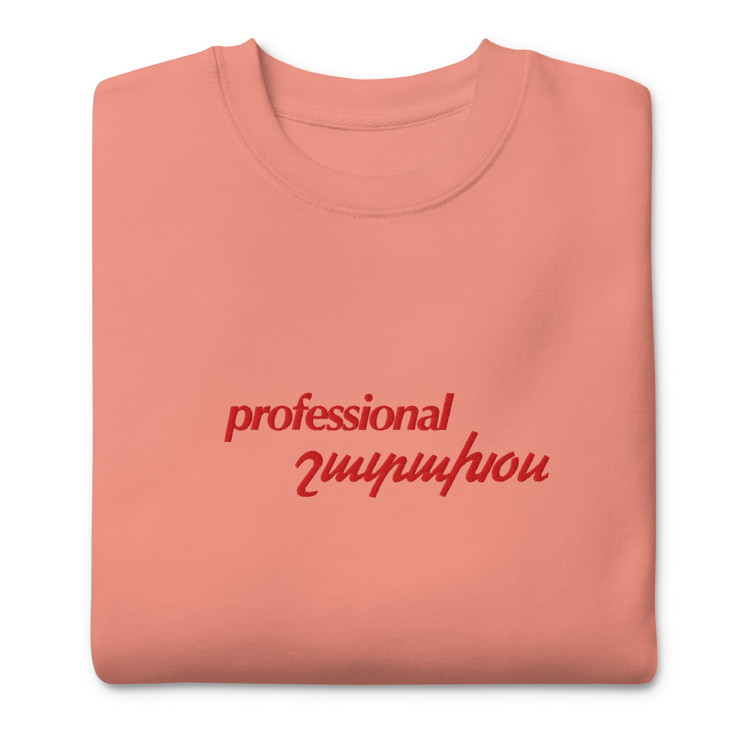 Peach crewneck depicting professional shadakhos, meaning yapper in Armenian