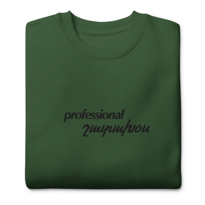 Green crewneck depicting professional shadakhos, meaning yapper in Armenian