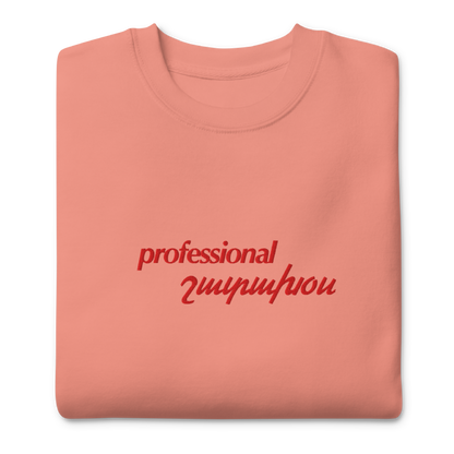 Peach crewneck depicting professional shadakhos, meaning yapper in Armenian